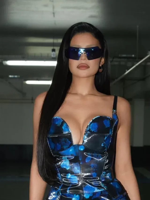 Kylie Jenner Looks Sizzling In Blue Mini Deep Neckline Dress.